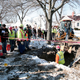 The first pipe is replaced. Photos by Bill Pugliano/Getty Images